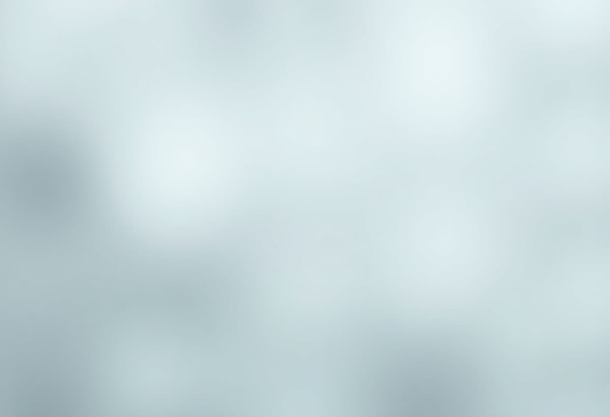 technician repairing a dishwasher with tools