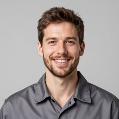 Expert gas oven repair technician Alex Johnson smiling, wearing a uniform. Alex has over 5 years of experience in gas appliance repair, specializing in Kenmore models and gas safety.